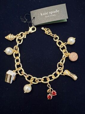kate spade gold-tone pastey charm bracelet with pearls and red cherry charms